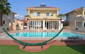 CV1956, Luxury beach front villa for sale in Pervolia with sea views.