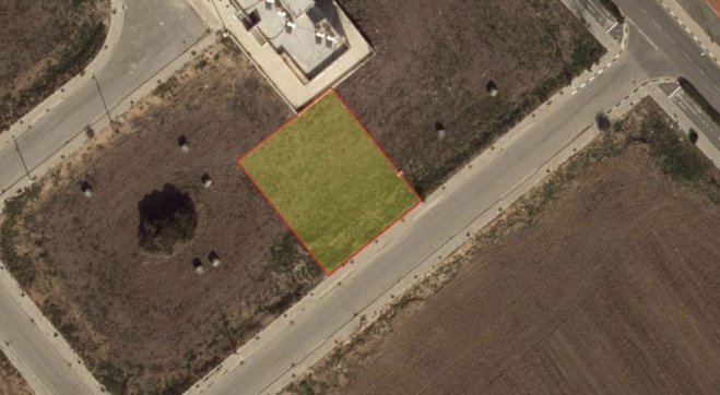 Residential building plot for sale in Pervolia with distance sea view.