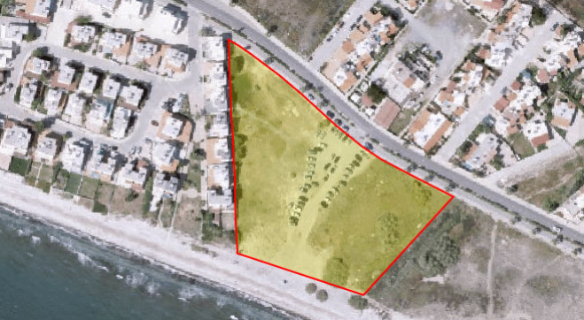 Coastal building land for sale in Pervolia.