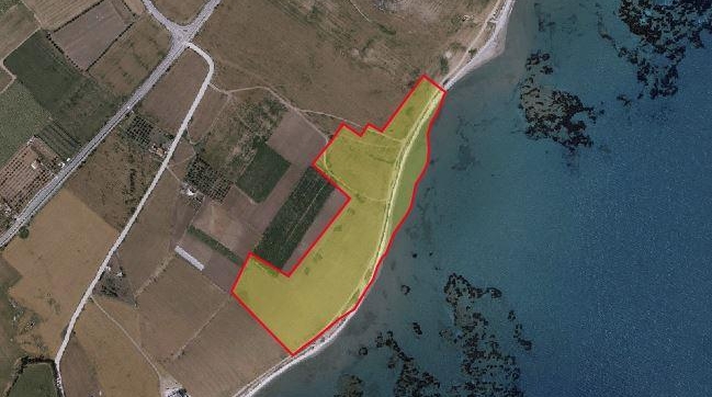 Huge land on the beach for sale in Softades.