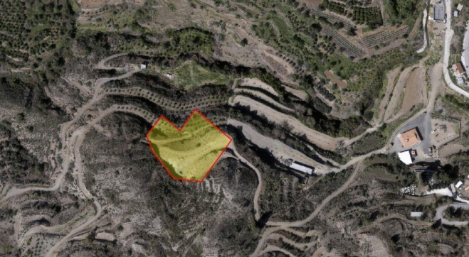 Land for sale on a hill with views of Agious Vavatsinia village.